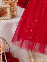 ⁦فستان حفلات شتائي احمر⁩ - الصورة ⁦4⁩